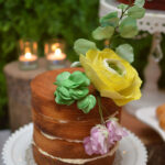 naked cake with sugar flowers